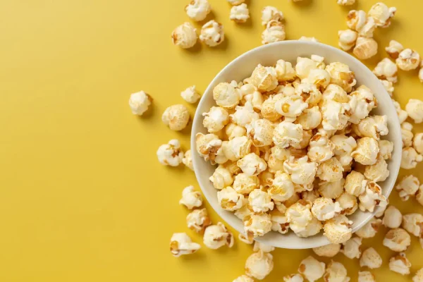 sweet-popcorn-yellow-background.webp